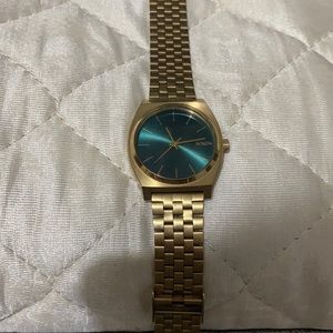 Gold Nixon watch